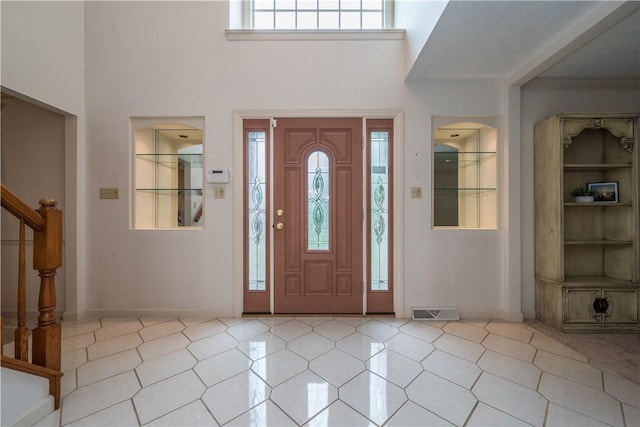 221 William Dr, North Strabane, PA 15317 - entrance foyer featuring stairs, a towering ceiling, and light tile patterned floors