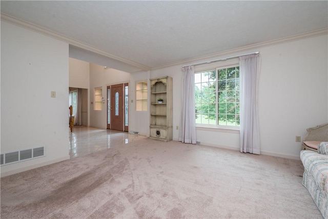 221 William Dr, North Strabane, PA 15317 - unfurnished living room featuring crown molding and light colored carpet