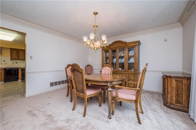 221 William Dr, North Strabane, PA 15317 - dining room with a chandelier, ornamental molding, and light carpet