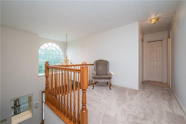 221 William Dr, North Strabane, PA 15317 - hall with an upstairs landing, carpet, and a chandelier