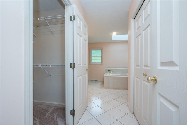 221 William Dr, North Strabane, PA 15317 - full bathroom with a garden tub, tile patterned flooring, and a spacious closet