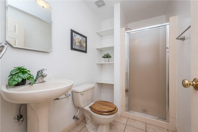 221 William Dr, North Strabane, PA 15317 - bathroom featuring a stall shower and tile patterned flooring