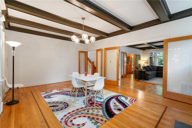 1463 Beechwood Blvd, Squirrel Hill, PA 15217 - dining area with light wood-type flooring, beamed ceiling, a chandelier, stairs, and french doors