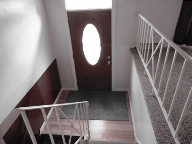 127 Louis Dr, Stowe Twp, PA 15136 - entryway with wood finished floors and stairs