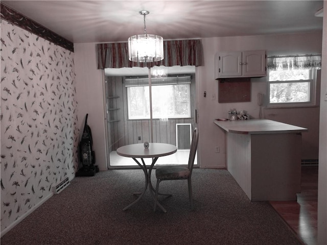 127 Louis Dr, Stowe Twp, PA 15136 - dining space with a chandelier and carpet flooring