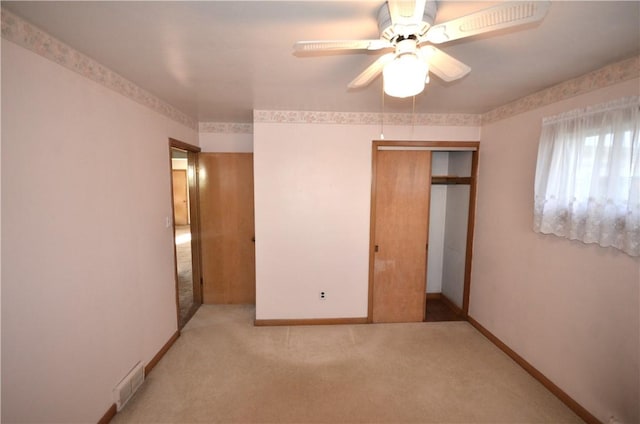 123 Jackson St, Harmony Boro But, PA 16037 - unfurnished bedroom with a closet, carpet floors, and a ceiling fan