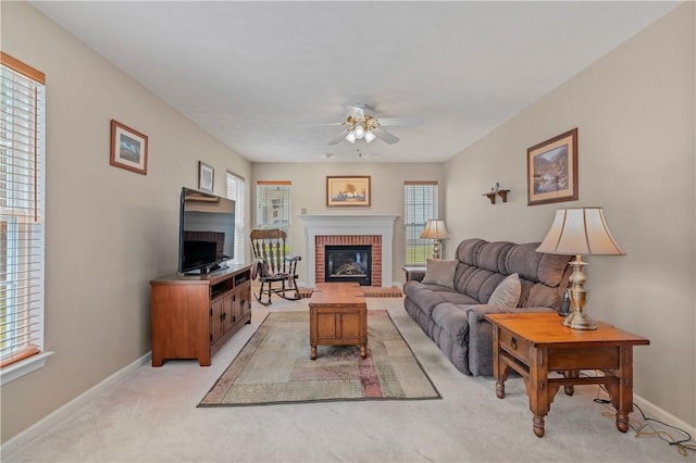 6032 Hawthorn Dr, Moon/Crescent Twp, PA 15108 - living room featuring a fireplace, ceiling fan, and light carpet