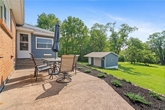 160 Sonnie Dr, Salem Twp Wml, PA 15624 - view of patio featuring an outdoor structure, outdoor dining area, and entry steps