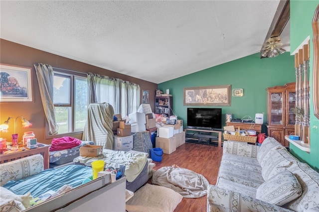 4835 Sterrettania Rd, Millcreek Twp Eri, PA 16506 - living area featuring lofted ceiling, wood finished floors, and a textured ceiling