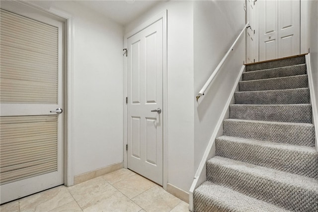 1606 Merriman Ct, South Side, PA 15203 - staircase with baseboards and tile patterned floors