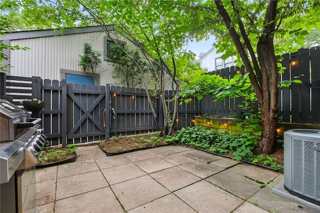 1606 Merriman Ct, South Side, PA 15203 - fenced backyard featuring a gate and a patio area