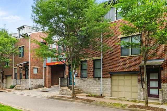 1606 Merriman Ct, South Side, PA 15203 - view of building exterior featuring a garage