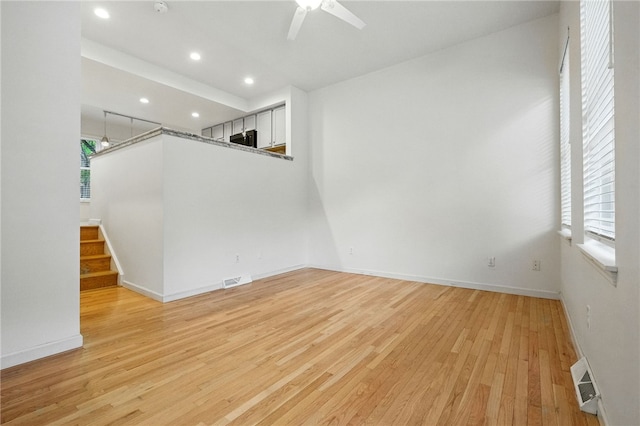1606 Merriman Ct, South Side, PA 15203 - unfurnished room with light wood-type flooring, recessed lighting, stairs, and a ceiling fan