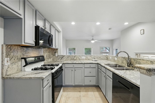 1606 Merriman Ct, South Side, PA 15203 - kitchen with black gas range oven, dishwasher, a ceiling fan, recessed lighting, and tasteful backsplash