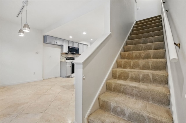 1606 Merriman Ct, South Side, PA 15203 - stairs featuring recessed lighting and tile patterned floors