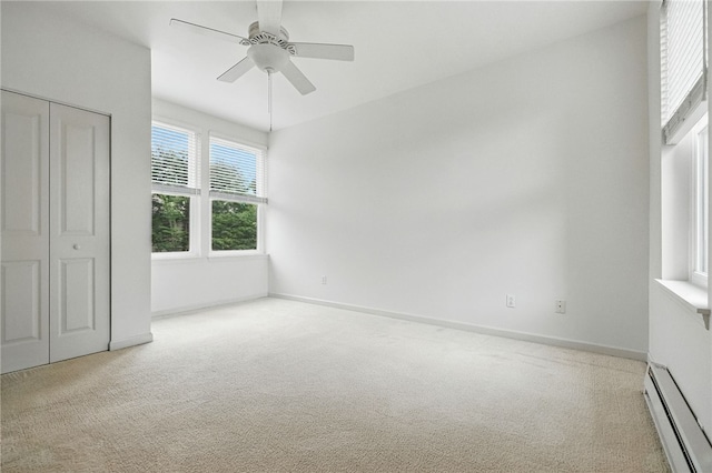 1606 Merriman Ct, South Side, PA 15203 - unfurnished bedroom with a baseboard heating unit, carpet, a ceiling fan, and a closet