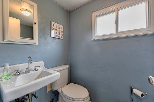 712 N 2nd St, Jeannette, PA 15644 - bathroom featuring toilet and a sink