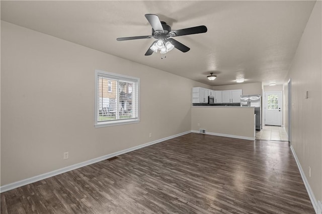 2960 Brevard Ave, Brentwood, PA 15227 - unfurnished living room with dark wood-style floors and a ceiling fan