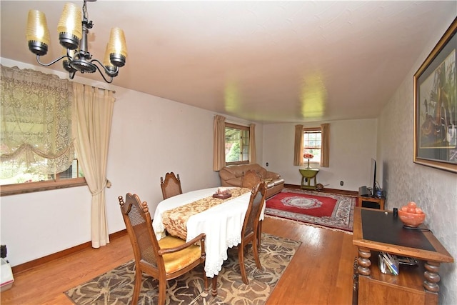 104 Sherwick Dr, Elizabeth Twp/Boro, PA 15037 - dining space featuring wood finished floors and a chandelier