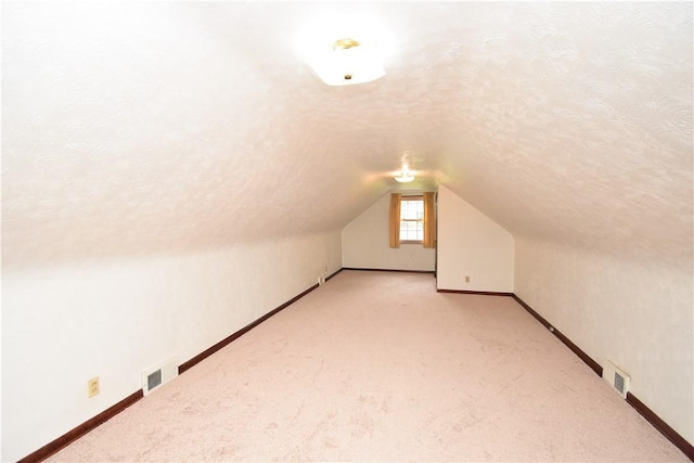 104 Sherwick Dr, Elizabeth Twp/Boro, PA 15037 - bonus room with a textured ceiling, lofted ceiling, and light colored carpet