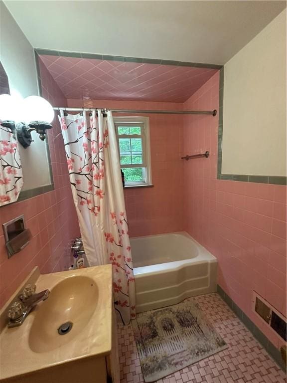 104 Sherwick Dr, Elizabeth Twp/Boro, PA 15037 - full bathroom with tile walls, shower / tub combo with curtain, vanity, and tile patterned floors