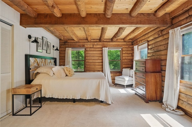 125 Timber Ridge Rd, Clinton Twp, PA 16056 - carpeted bedroom featuring a wood ceiling with exposed beams and log walls