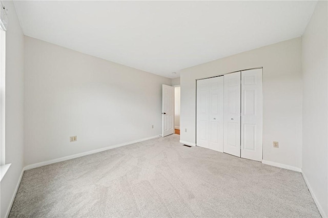 11 Sunset Ct, Cranberry Twp, PA 16066 - unfurnished bedroom featuring light colored carpet and a closet