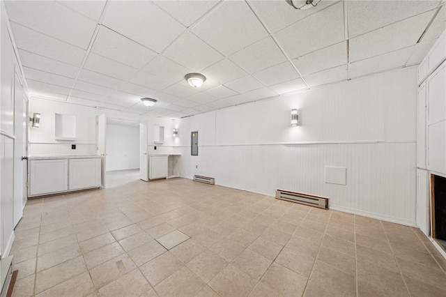 11 Sunset Ct, Cranberry Twp, PA 16066 - unfurnished living room with electric panel, a drop ceiling, and light tile patterned floors