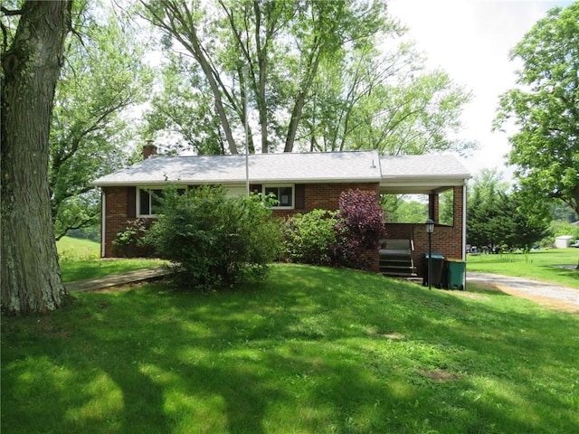 1332 Oakridge Rd, South Fayette, PA 15057 - view of front of house with brick siding, a chimney, and a front yard