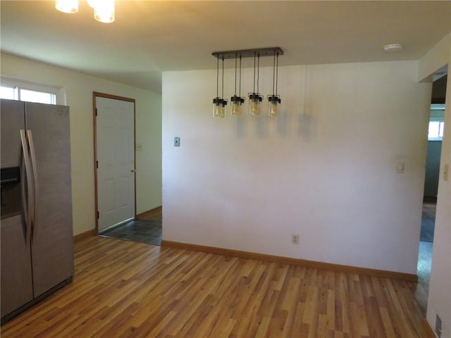 1332 Oakridge Rd, South Fayette, PA 15057 - unfurnished dining area featuring wood finished floors and healthy amount of natural light