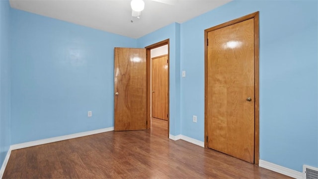 1127 State Route 885, Jefferson Hills, PA 15025 - unfurnished bedroom with wood finished floors and a ceiling fan