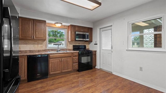 1127 State Route 885, Jefferson Hills, PA 15025 - kitchen featuring black appliances, tasteful backsplash, dark wood-style floors, and dark countertops