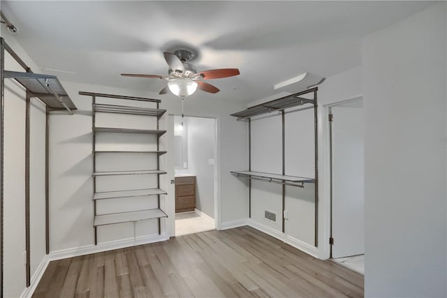 331 Hoffman Rd, Reserve, PA 15212 - walk in closet featuring wood finished floors and ceiling fan