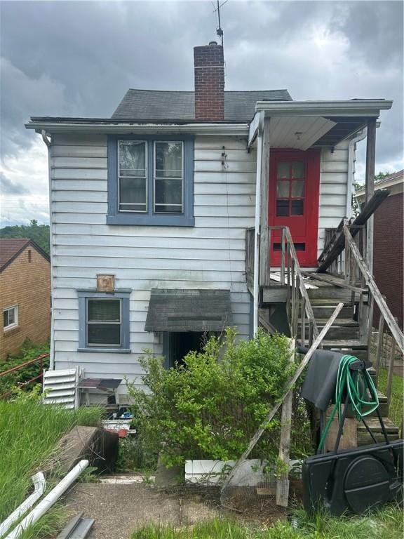 2607 Spring St, Arlington, PA 15210 - rear view of property with a chimney