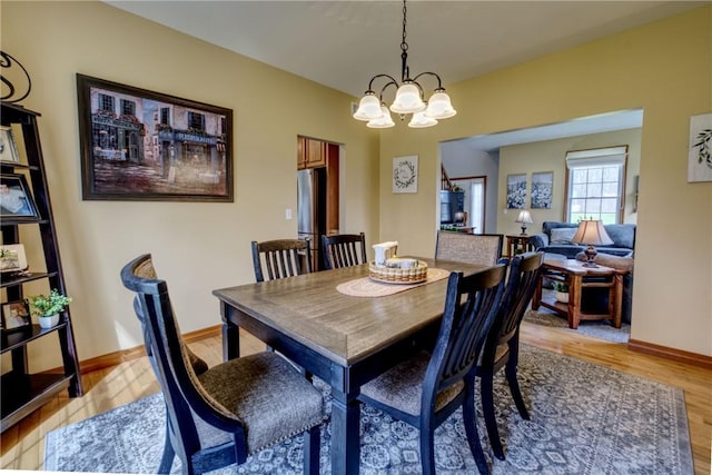 1603 Lori Ln, Hermitage, PA 16148 - dining space featuring a chandelier and light wood finished floors