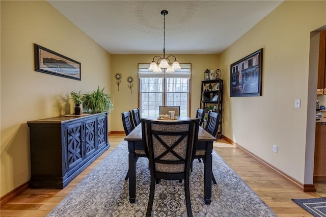 1603 Lori Ln, Hermitage, PA 16148 - dining space with light wood-style flooring and a chandelier