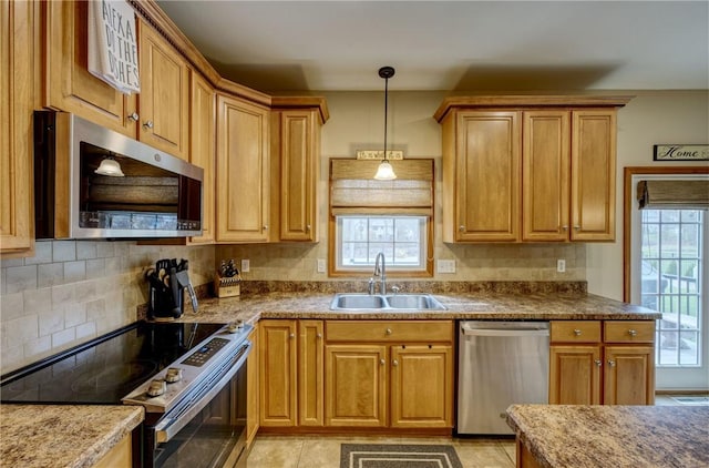 1603 Lori Ln, Hermitage, PA 16148 - kitchen with appliances with stainless steel finishes, tasteful backsplash, and decorative light fixtures