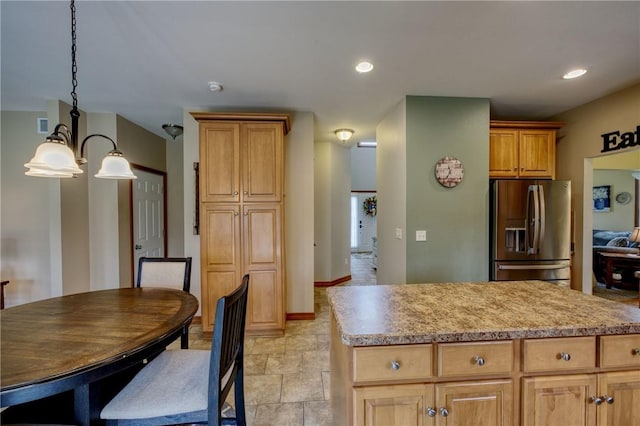 1603 Lori Ln, Hermitage, PA 16148 - kitchen with stainless steel fridge, pendant lighting, recessed lighting, and light stone finish flooring