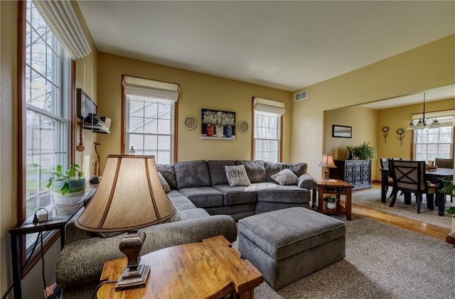 1603 Lori Ln, Hermitage, PA 16148 - living area featuring carpet flooring and a chandelier