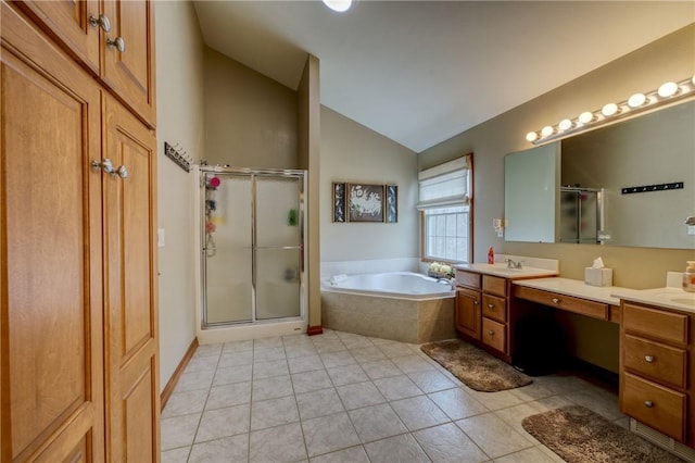 1603 Lori Ln, Hermitage, PA 16148 - full bathroom with vaulted ceiling, double vanity, a shower stall, a bath, and tile patterned flooring