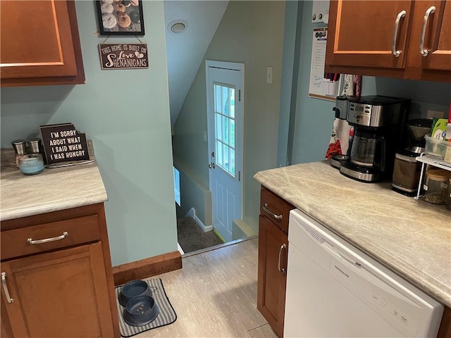 2568 Mercer St, Sandy Lake Boro, PA 16145 - kitchen with dishwasher, light wood-style floors, light countertops, and vaulted ceiling