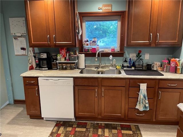 2568 Mercer St, Sandy Lake Boro, PA 16145 - kitchen with dishwasher, light countertops, and light wood-style flooring