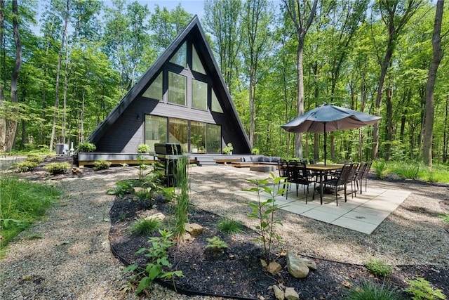 3019 Oak Ridge Ln, Saltlick Twp, PA 15622 - rear view of property featuring a patio