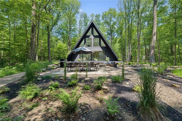 3019 Oak Ridge Ln, Saltlick Twp, PA 15622 - rear view of property with a patio