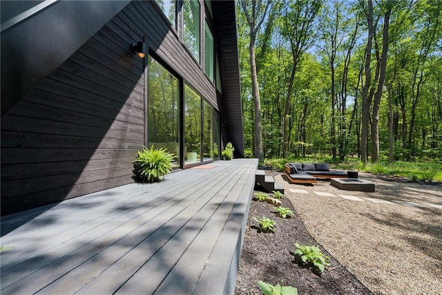 3019 Oak Ridge Ln, Saltlick Twp, PA 15622 - wooden deck with an outdoor living space with a fire pit