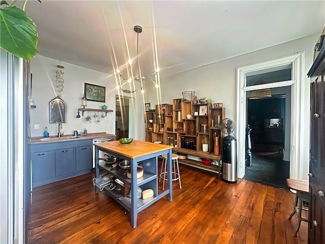 389 Rices Landing Rd, Luzerne Twp, PA 15433 - kitchen with open shelves, wooden counters, dark wood-type flooring, and decorative light fixtures