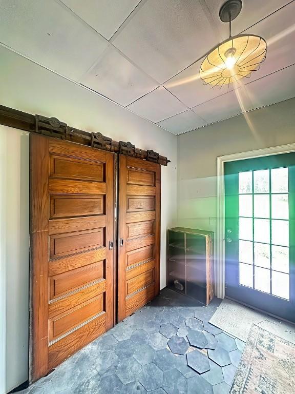 389 Rices Landing Rd, Luzerne Twp, PA 15433 - doorway with a barn door