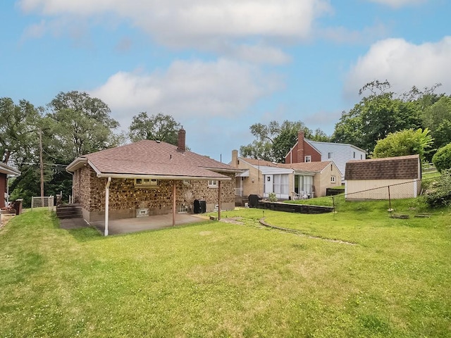 127 Pleasant Hills Blvd, Pleasant Hills, PA 15236 - back of property with a patio area and a chimney