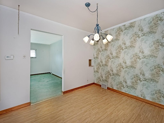 127 Pleasant Hills Blvd, Pleasant Hills, PA 15236 - unfurnished room with wood finished floors, a chandelier, and ornamental molding