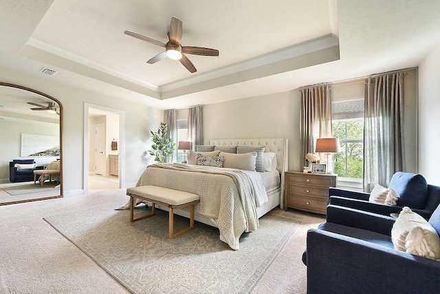 622 Burberry Blvd, Lehigh Twp, PA 16063 - bedroom with a tray ceiling, light colored carpet, ensuite bathroom, and a ceiling fan